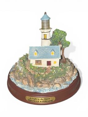 Thomas Kinkade "A Light in the Storm" illuminated lighthouse figurine UNTESTED